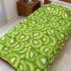 Green kiwi slices pattern on this velveteen blanket from WyntersArtGarden.com